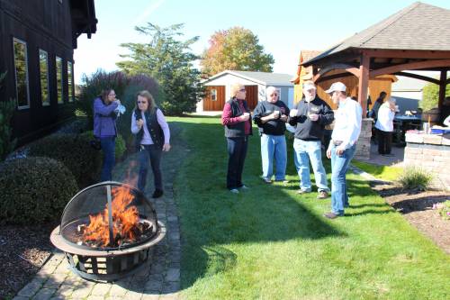 Enjoying the bonfire (with wood pellets from our shop)