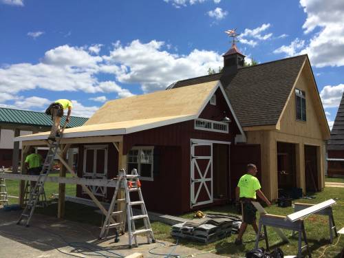 Setting up a Grand Victorian with overhang (Newport Custom Garage in background)