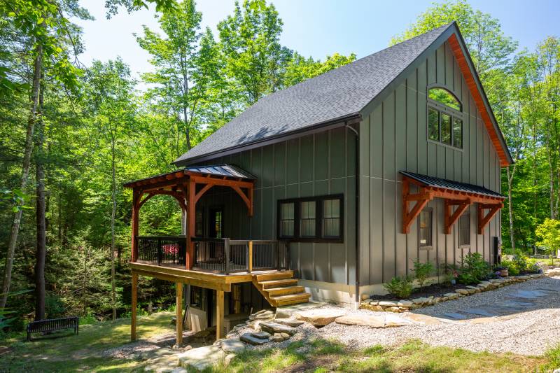 Covered Deck • Timber Frame Barn Home