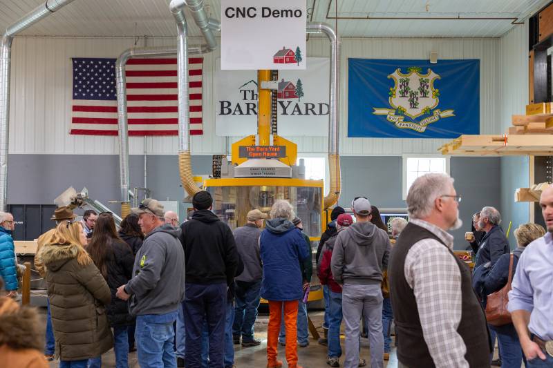 Visitors Gathered Around the Live CNC Demo